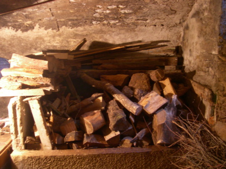 stone tub under firewood